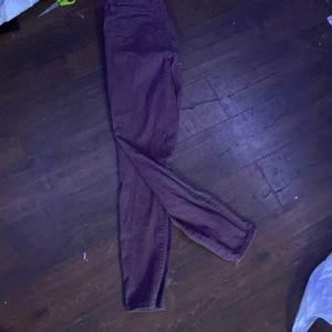Royalty for me maroon brown jeans.